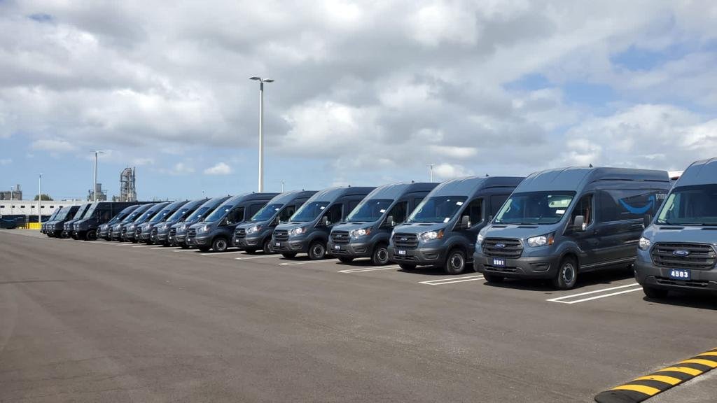 BOOZ delivery van fleet parked at the station